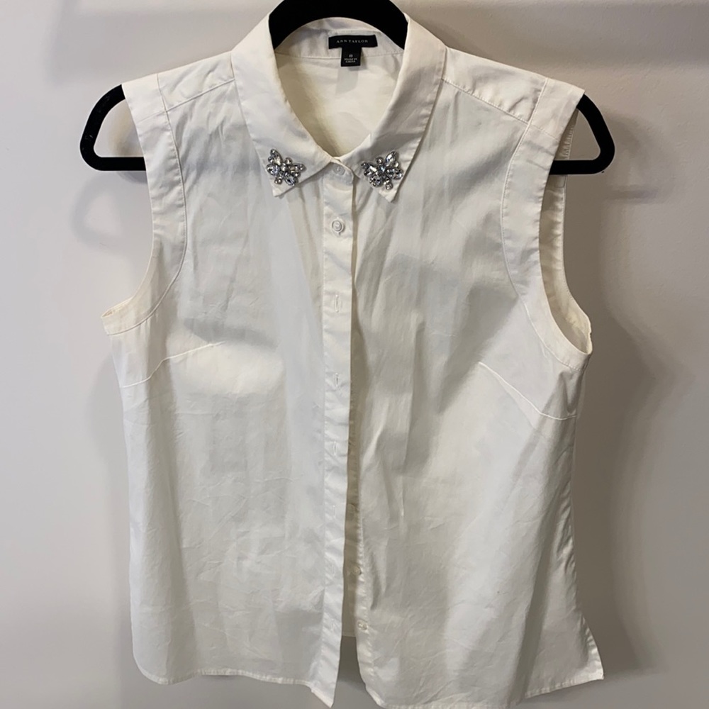 Sleeveless button down with jeweled collar
